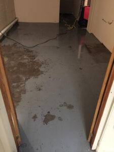 911 restoration flooded grey concrete floor South Bay Los Angeles